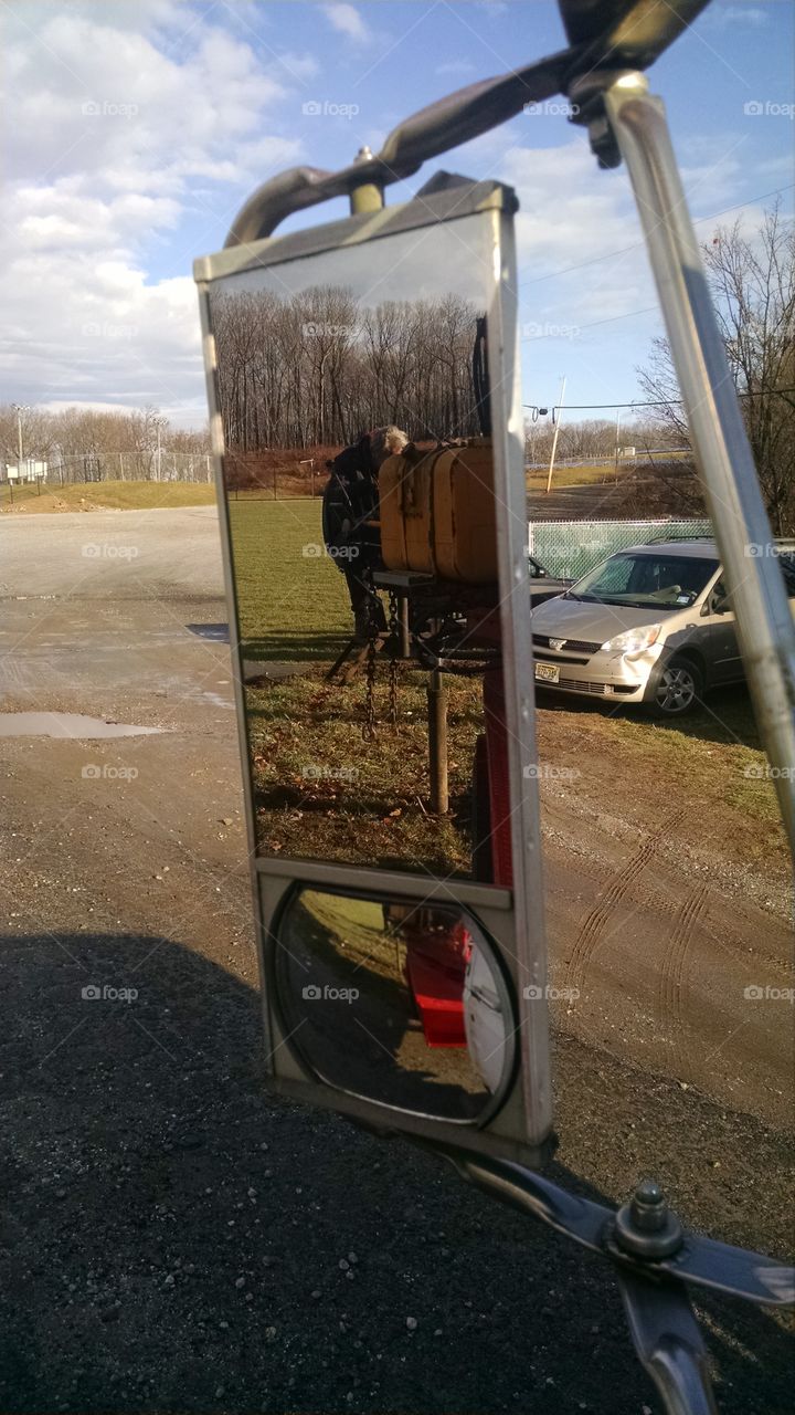 work at the civic center. using an auger to dig holes