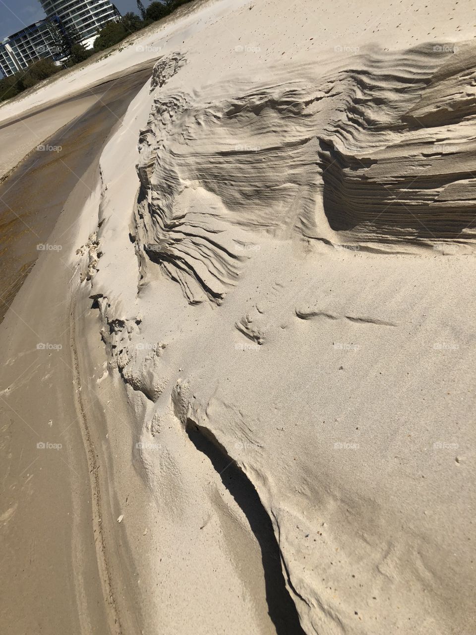 Eroding sand