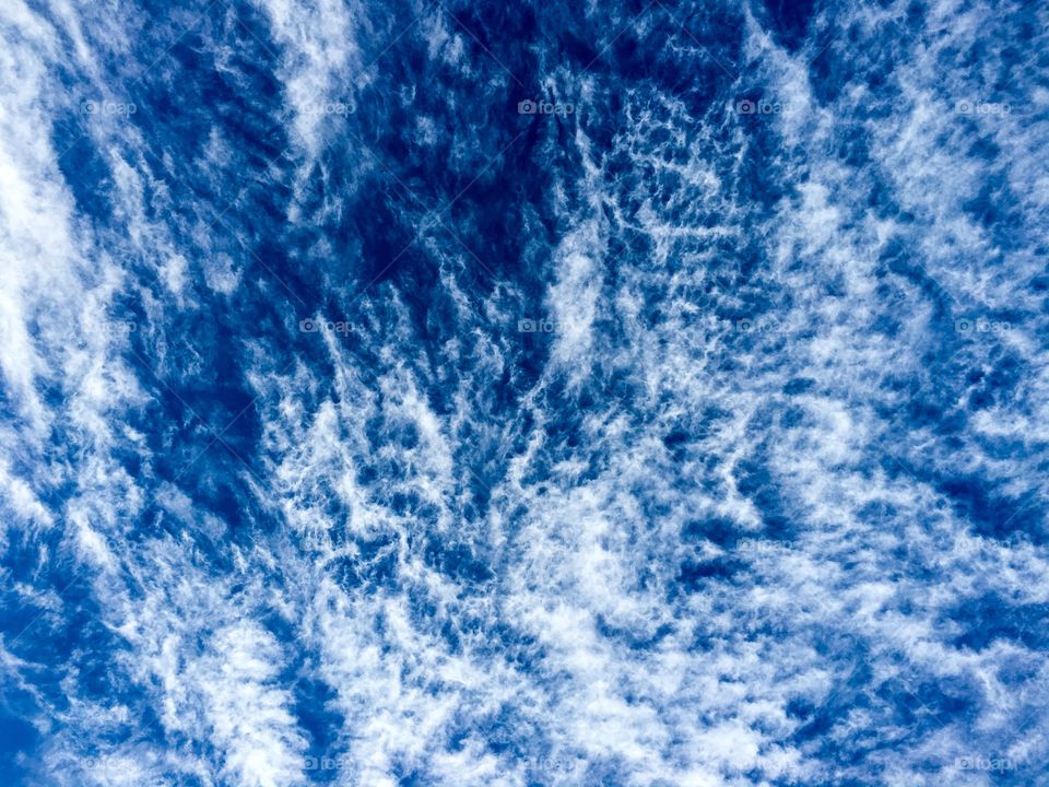Horsetail clouds in cobalt blue Australian sky closeup
Background backdrop image 