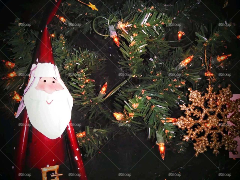Christmas tree background with traditional Santa Clause
