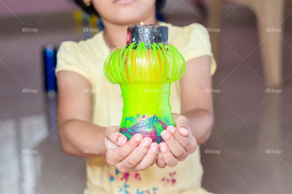 Diy plastic bottle candle holder.