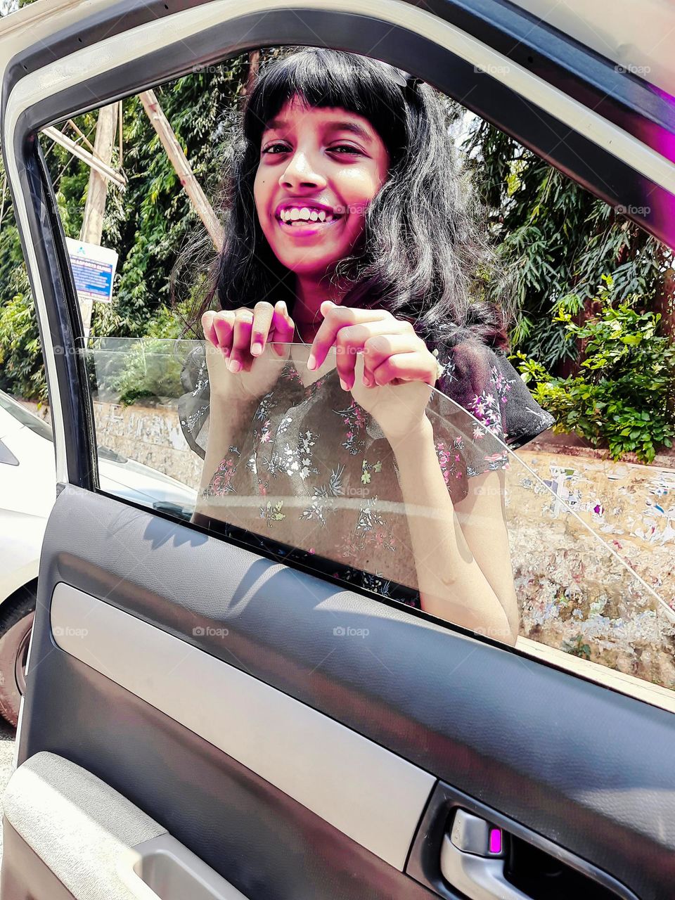 Girl in Car Window