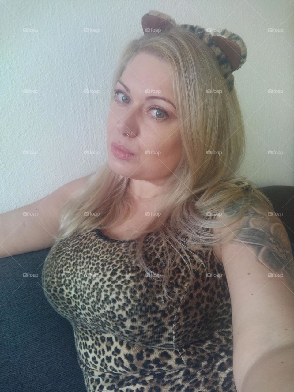 Blonde woman in leopard print dress