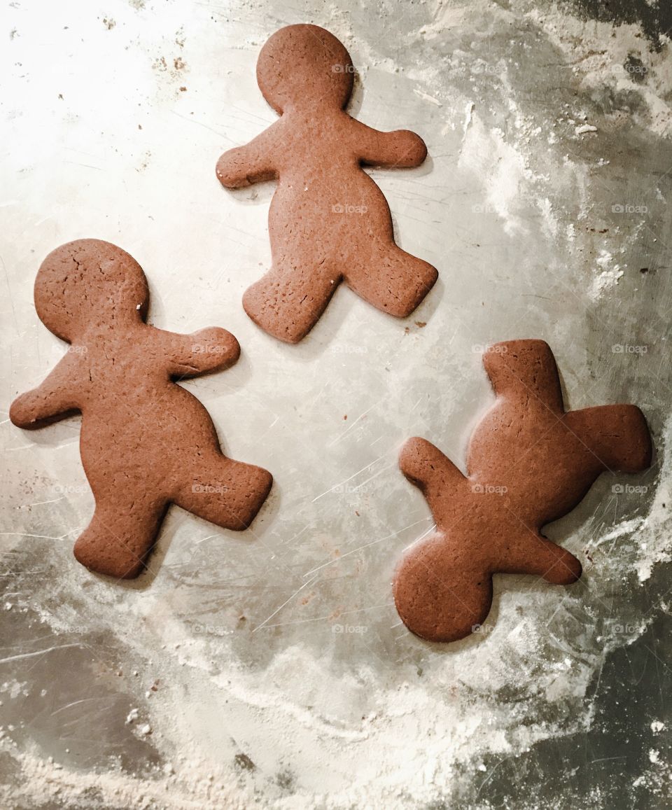 Gingerbread men fresh out of the oven. Yum is on the way. 