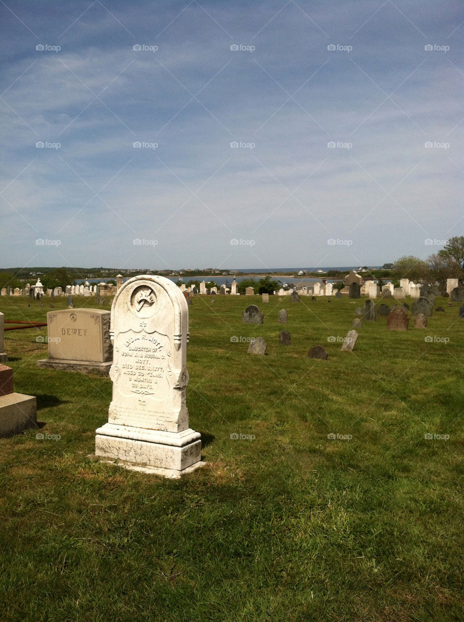 sky grass summer graveyard by hatchkelsey