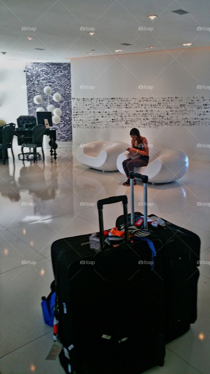 Resort traveler getting free WiFi while checking in.. Mondrian South Beach