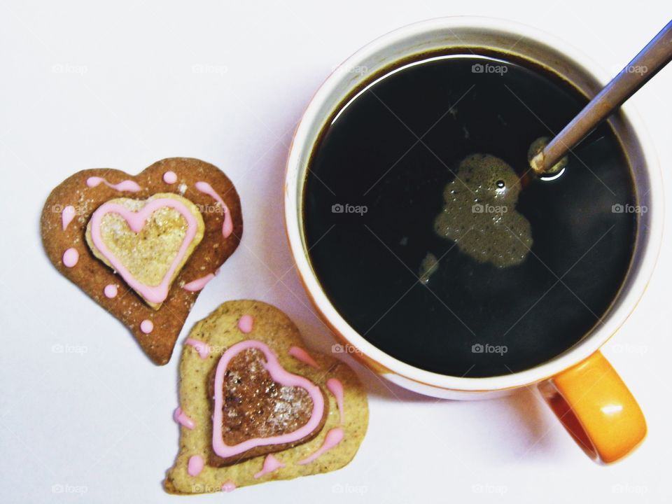 High angle view of coffee and cookies