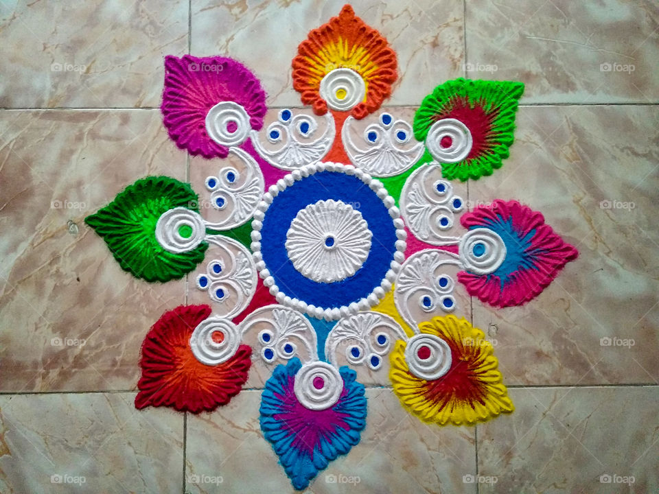 Beautiful Handmade Rangoli made on the occasion of Diwali ( Deepawali ) / The festival of Lights, decorations, joy and happiness / Indian Festival / Culture and Traditions / Colorful Street Drawing