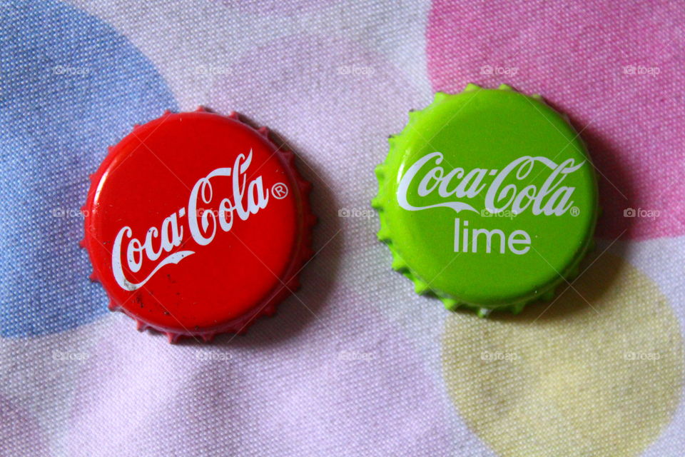 Coca cola green and red caps