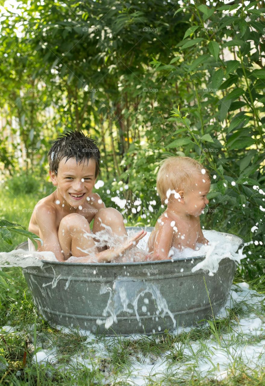 Happy kids at the village, countryside 