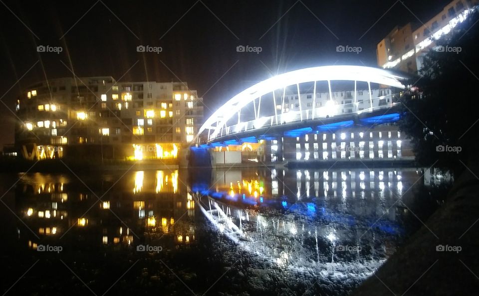 Century City Cape Town reflections of buildings and bridges on the canal - night time