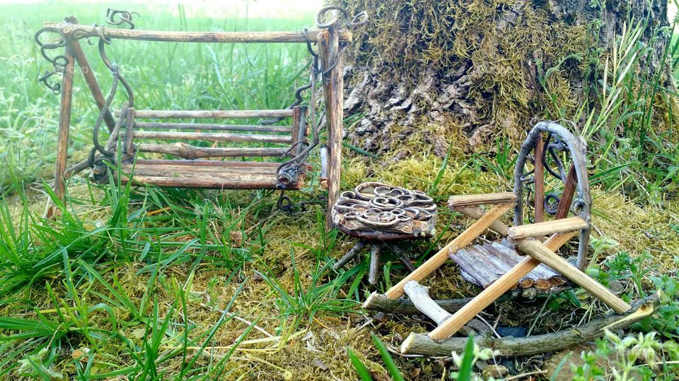 fairy furniture in a mossy garden