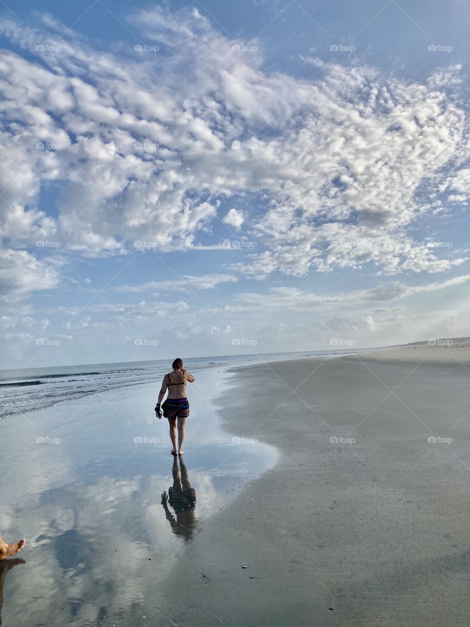 Woman during Morning walk in the beach 