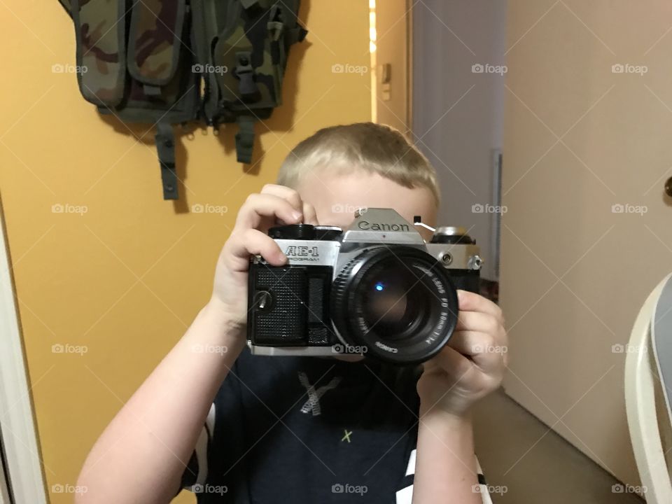 My son the future photographer
