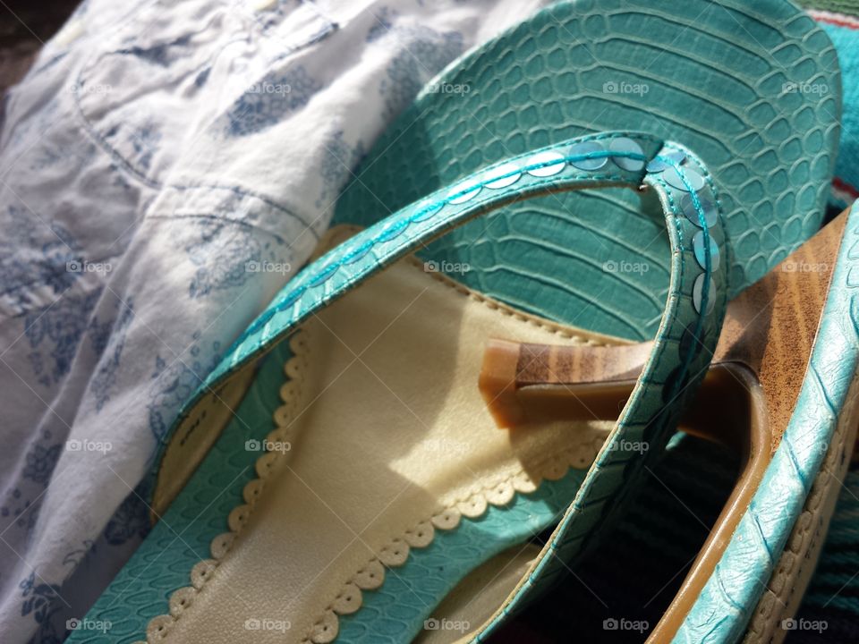 High heels sandals on cloth
