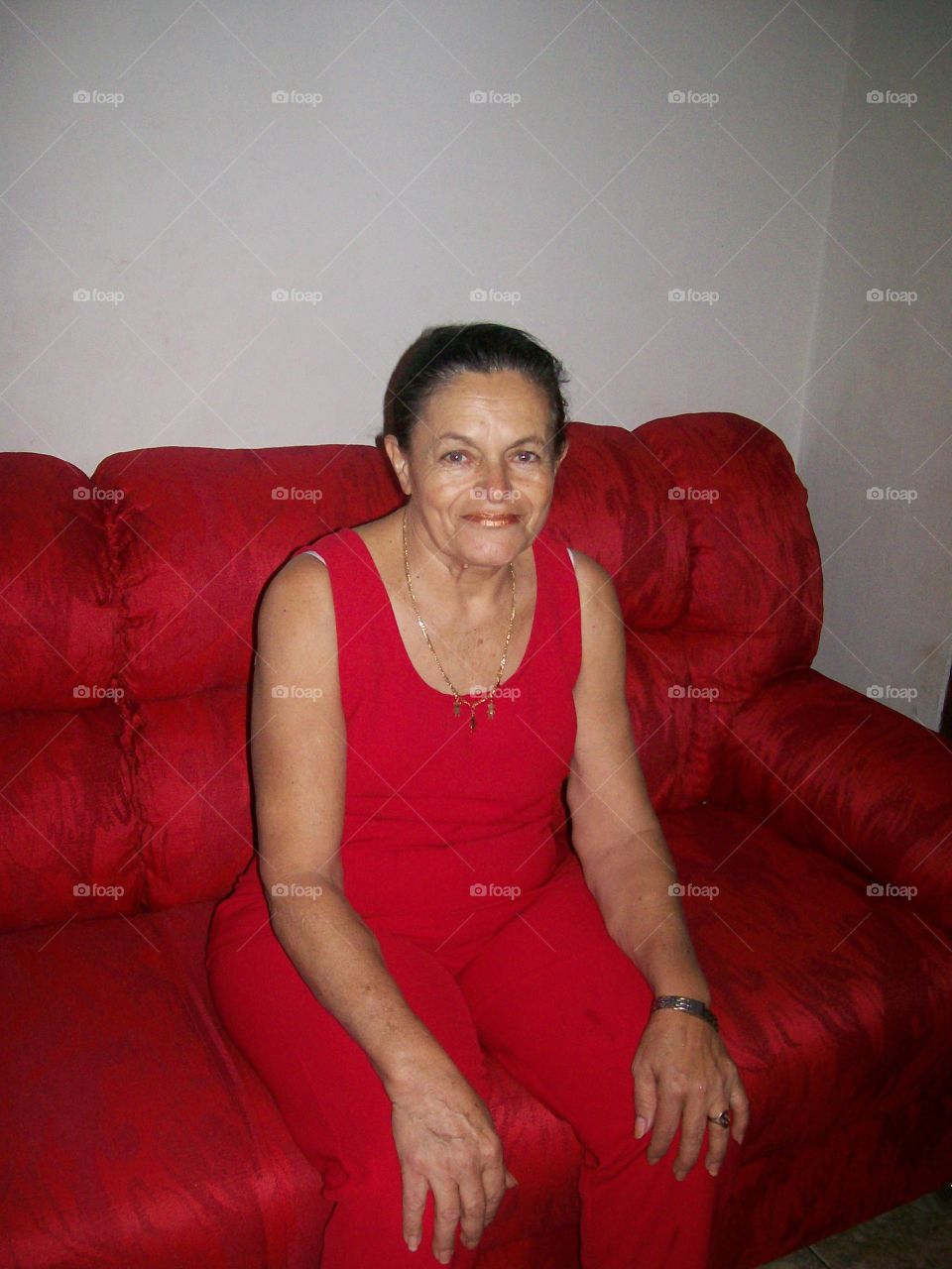 all red clothes, sofa and lipstick