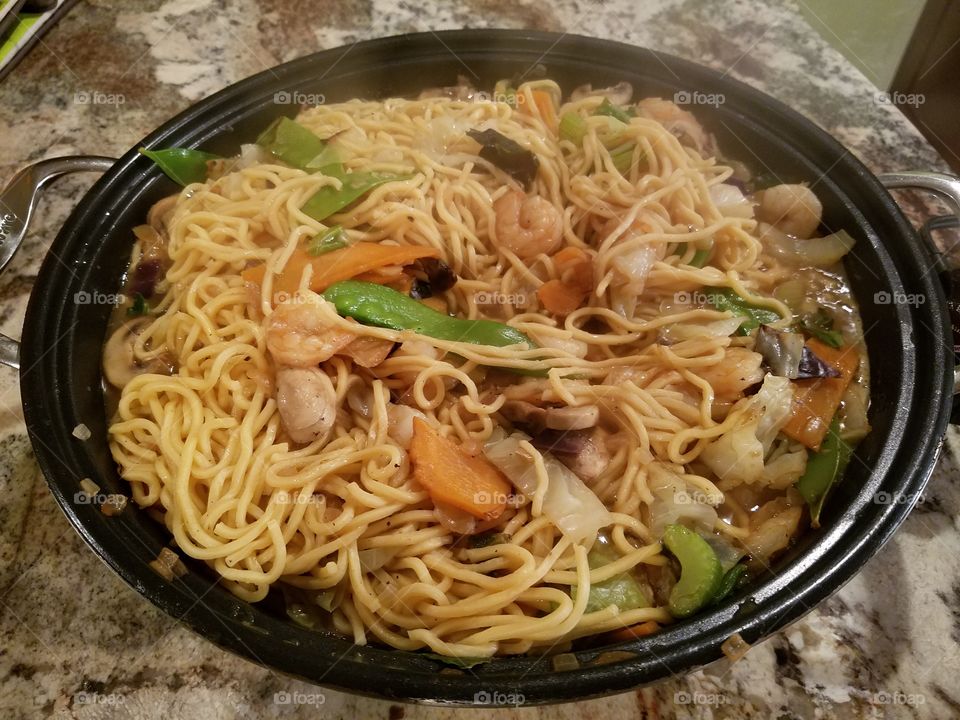 homemade stir fry with shrimp and noodles