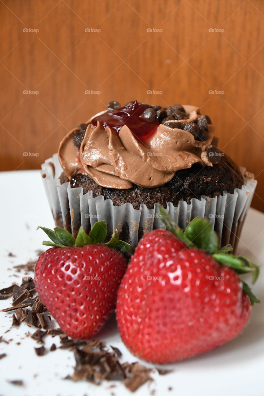 chocolate cupcake with strawberries