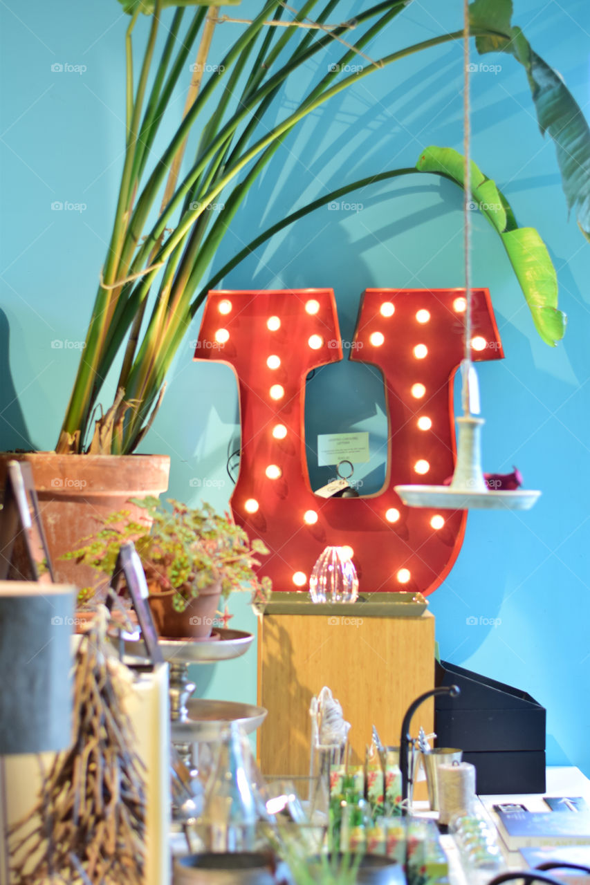 Orange pop of color. The U up in lights
