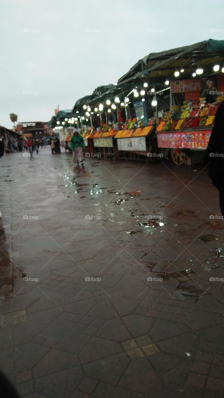 vendors of orange juice at Jamaalfna square in Marrakesh city in Morocco.