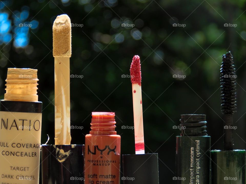 Concealer, lipstick and mascara
