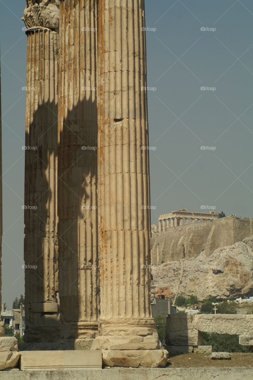Ruins in Athens, Greece . Photo taken to show ruins with the Parthenon in the background.