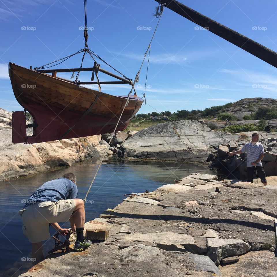 launching an old wooden boat