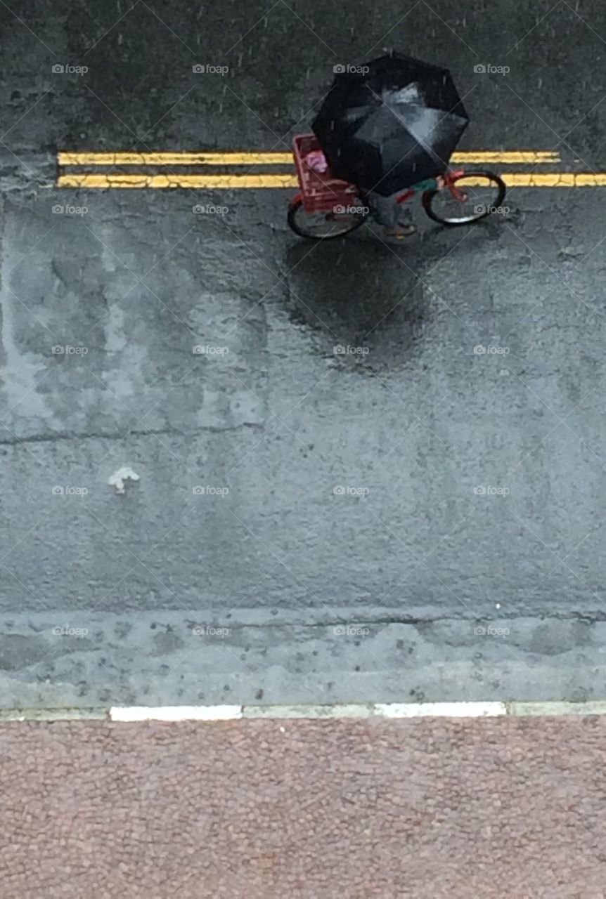 pedaling in the rain