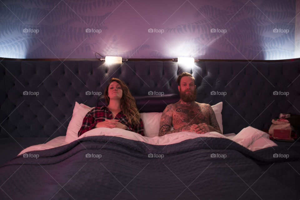Hipster Couple in Bed