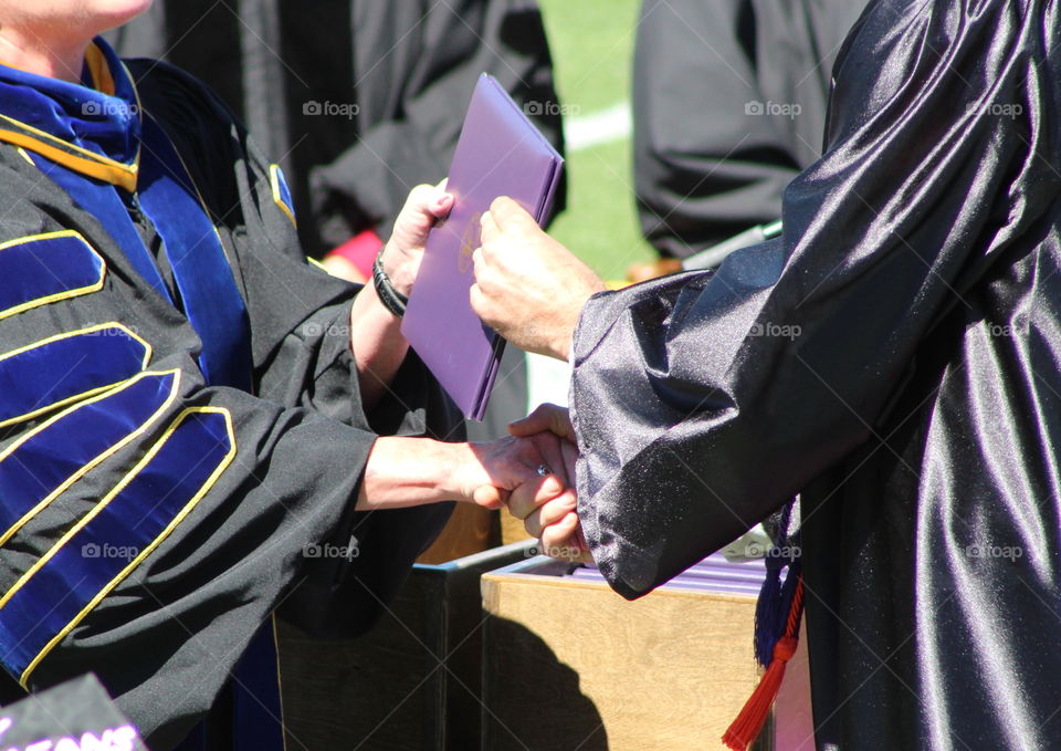 College Graduate Receiving Diploma 