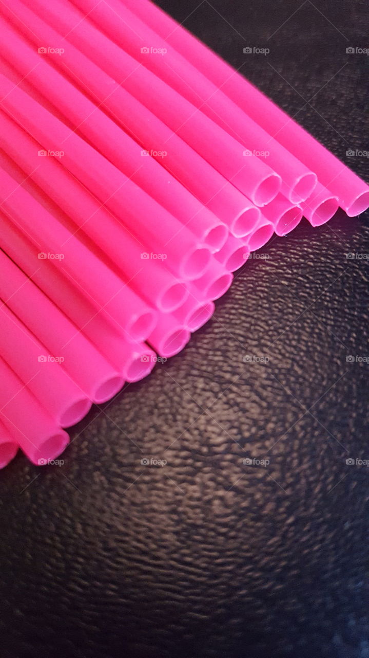 Pink drinking straw