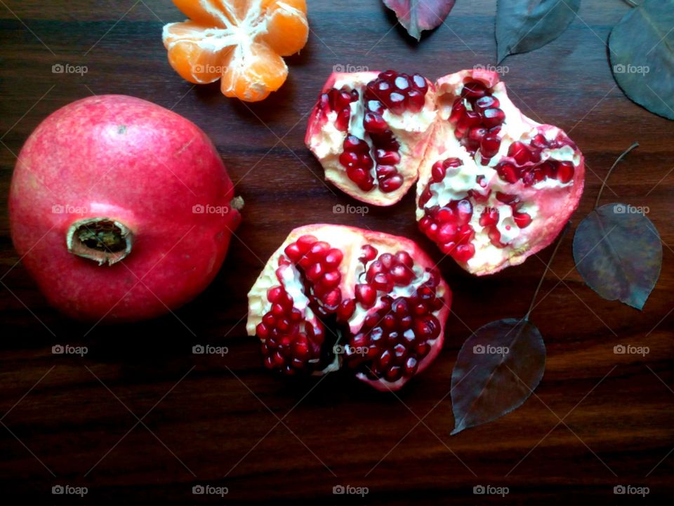 pomegranate seeds and fruit background