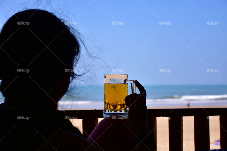 having beer seaside beach blue sky relaxing relaxation woman