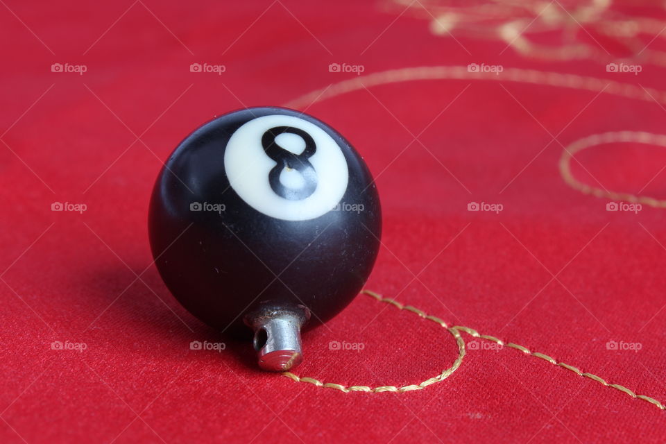 eight ball on red background