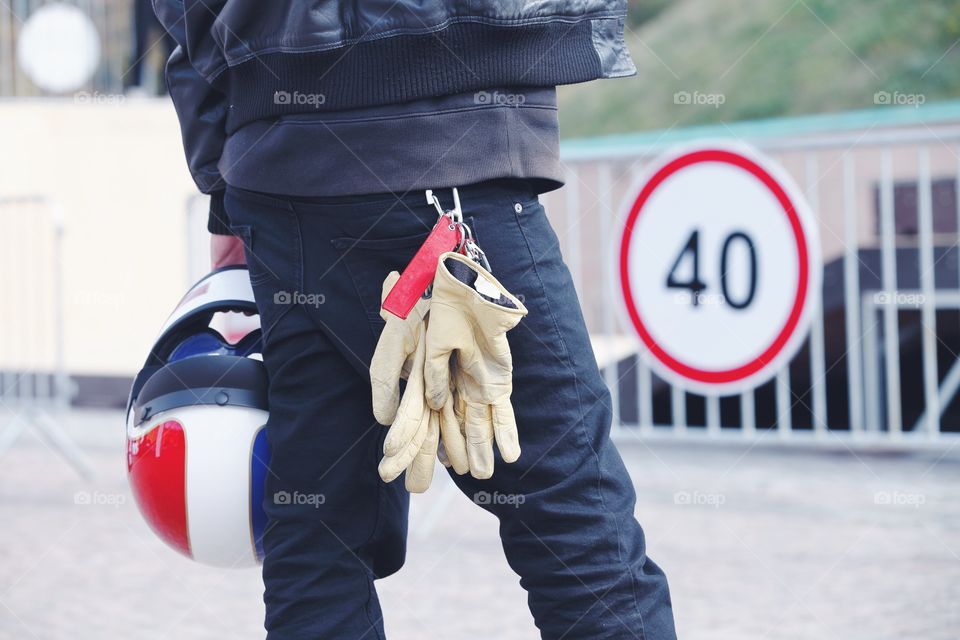 Man with the helmet and gloves