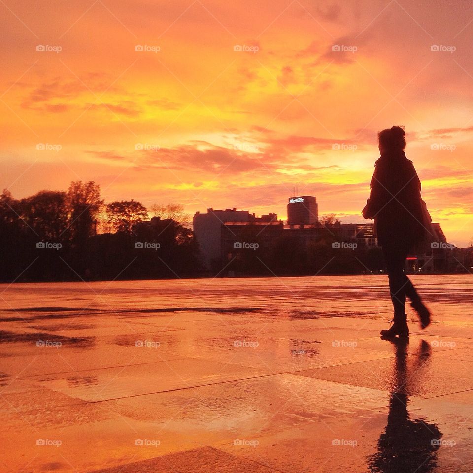 Girl walking in the sunset
