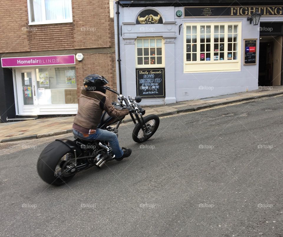 Unusual motorbike revving up a hill in Durham City