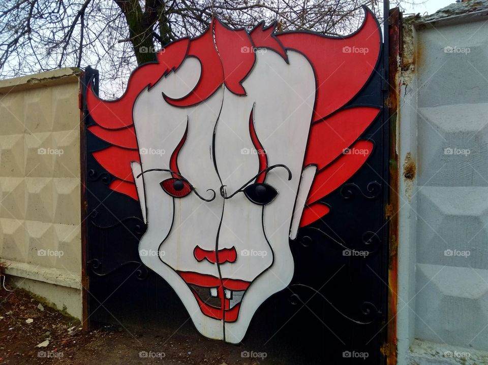 Metal gates in the form of Pennywise