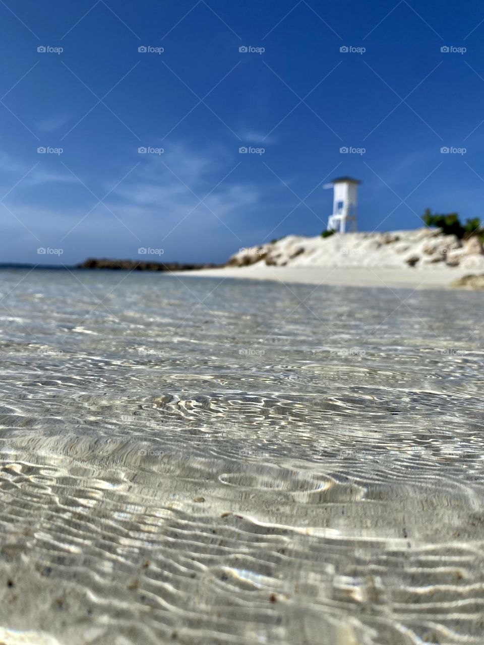 Clear water at a beautiful beach in the Bahia Principe Grand Jamaica hotel area 
