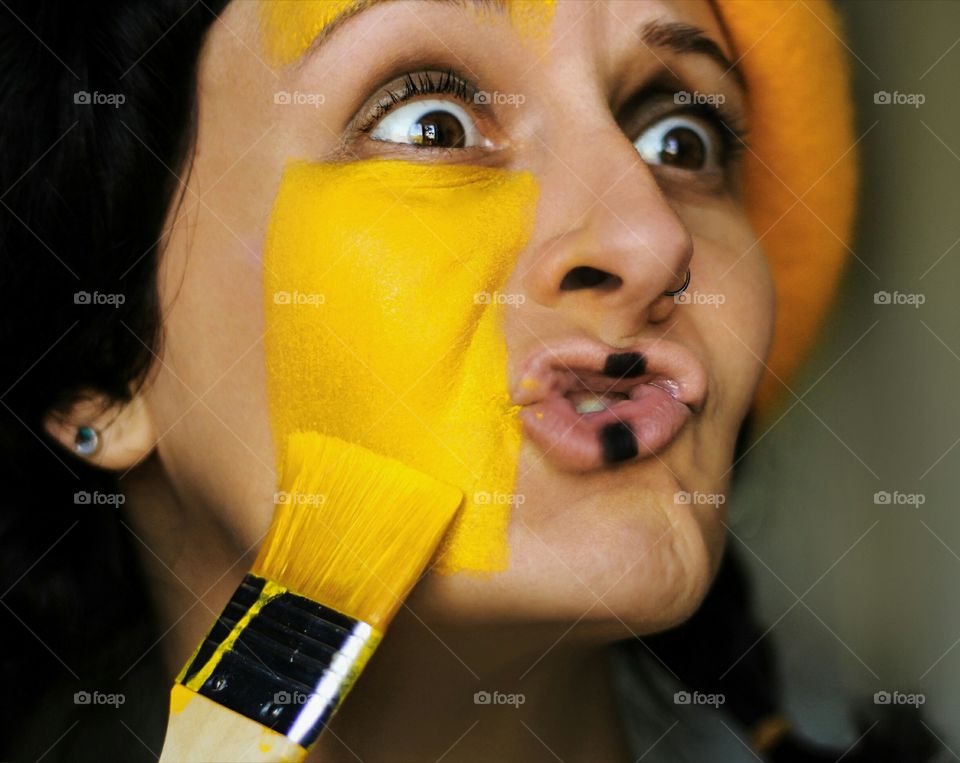 Fun moments, painting my face in yellow