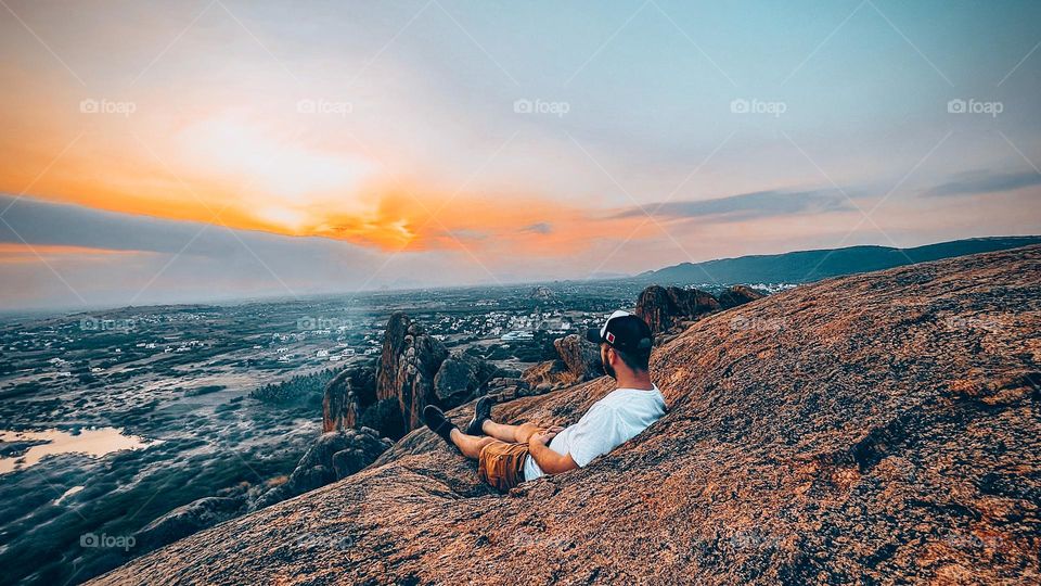 A man enjoying the sunset view