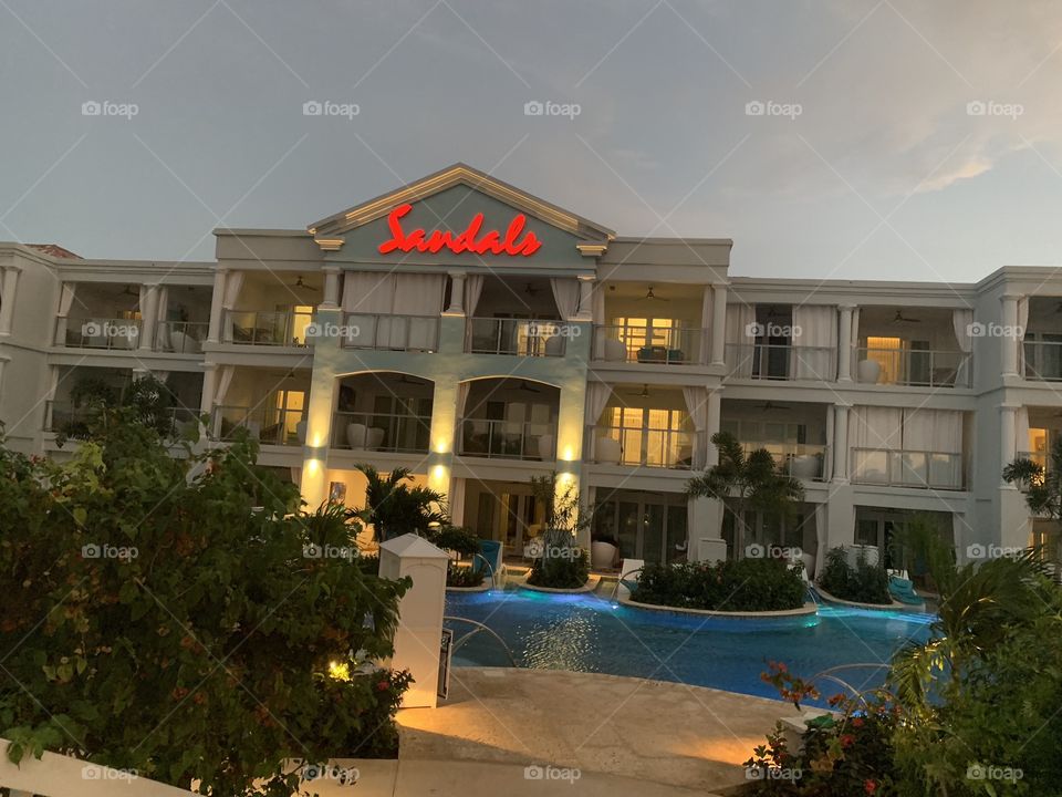 New building at Sandals Hotel Montego Bay , Jamaica with a pool entrance for each room