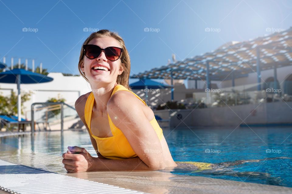 woman swimming in pool