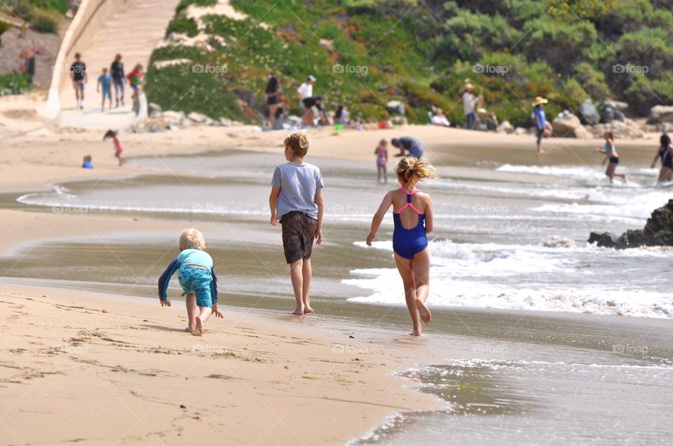 Kids playing on the beach