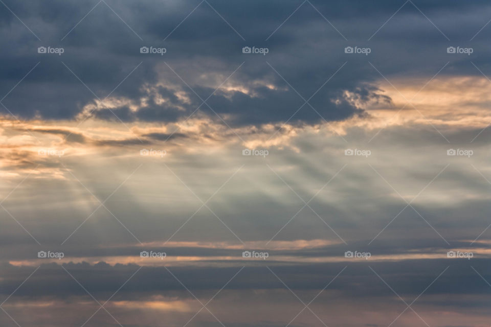 Sunrays shining through the clouds