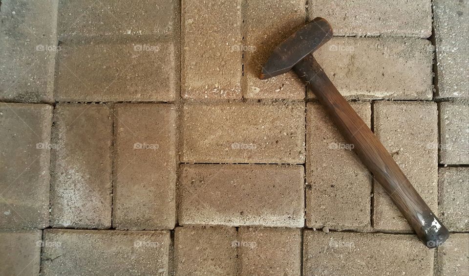 Hammer on Bricks