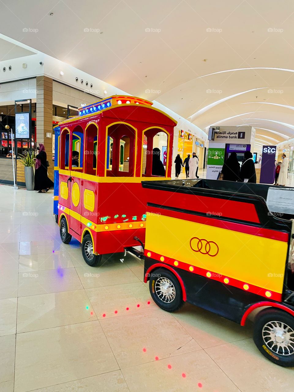 Color red. Red train in a mall