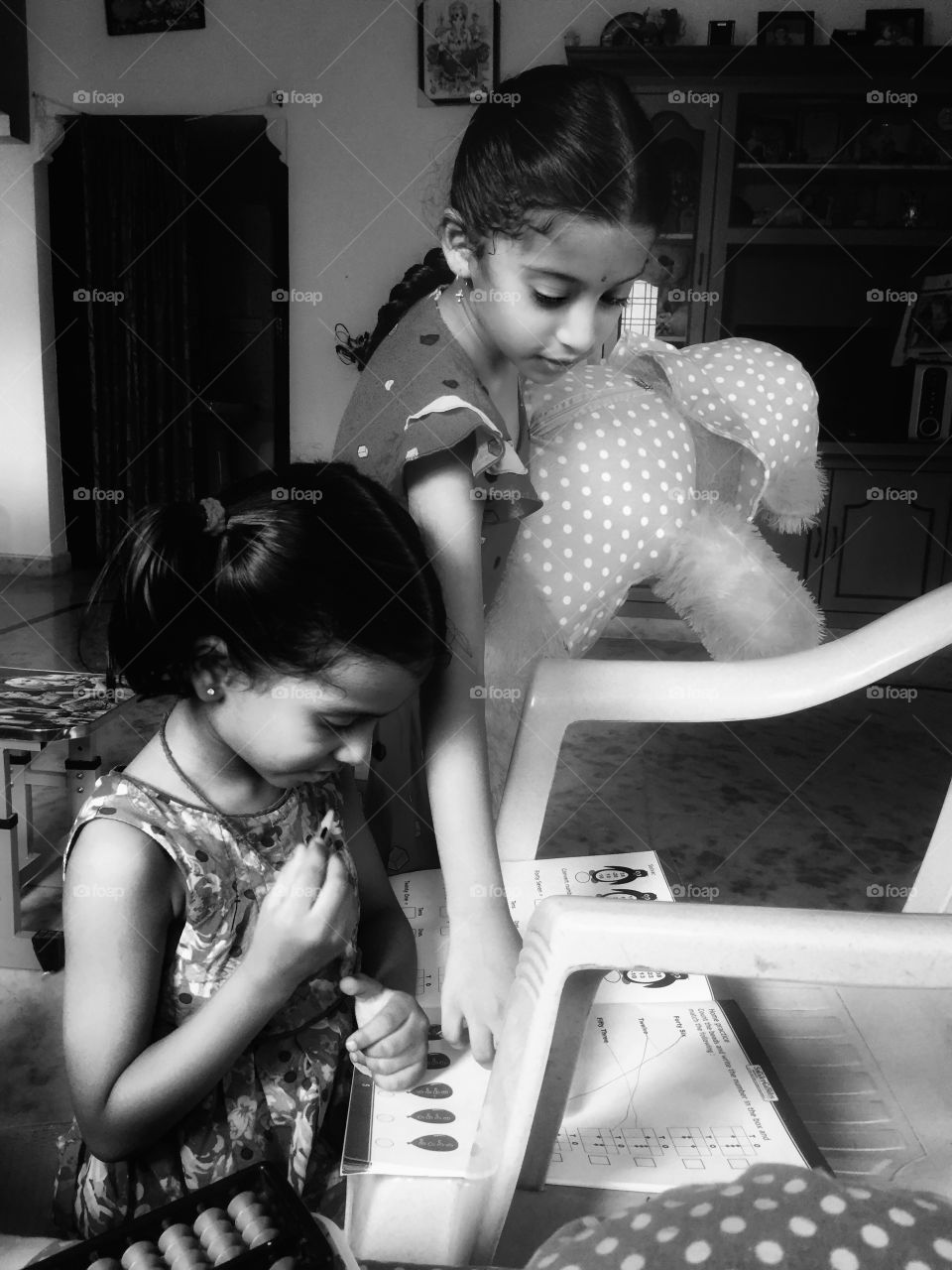 Elder sister clearing doubts of her younger sister..