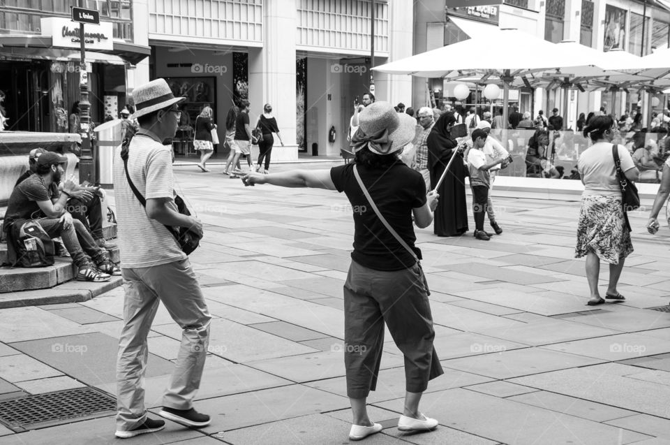 Two chinese womwn taking selfies