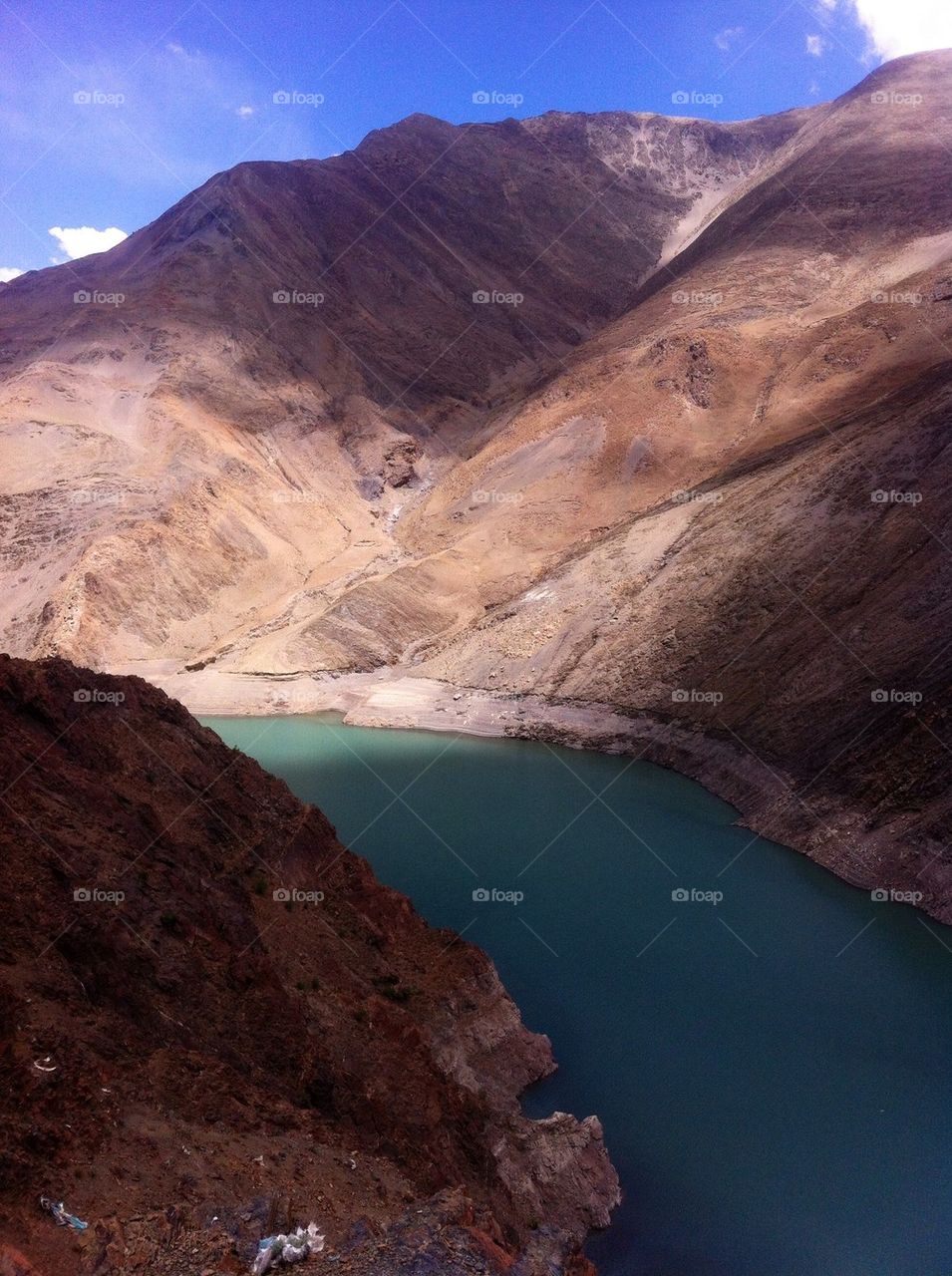 View of lake by mountains